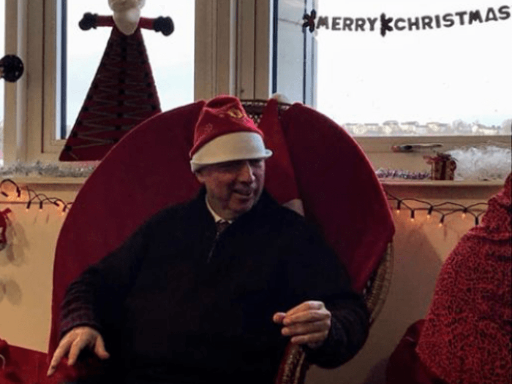 Gerry McHugh in a Santa hat at Christmas